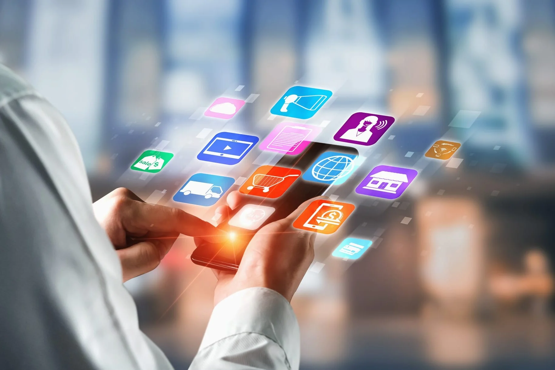 Teaserbild für den Bereich Software mit Mobilcomputer und farbig skizzierten Apps